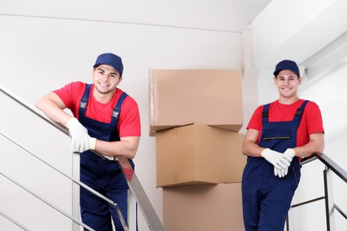 Professional flat removals in Cricklewood with moving boxes and furniture