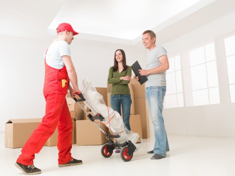 Preparing for a move in Cricklewood with boxes and labels