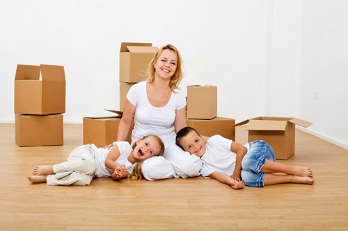 A compact removals team handling a studio flat move in Cricklewood