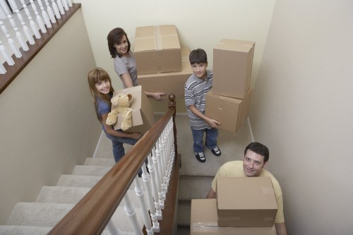Packed boxes and furniture in a Cricklewood storage unit